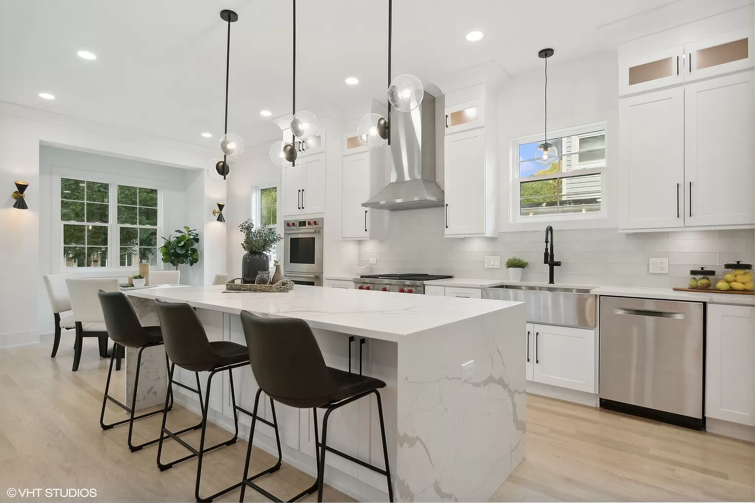 Full kitchen renovation with expansive island and premium finishes